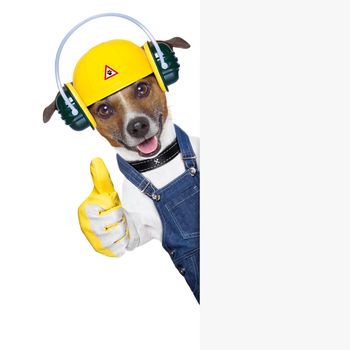 funny under construction dog with thumb up behind a placard