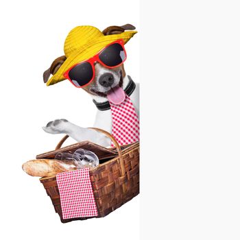 picnic dog behind placard with basket and bread