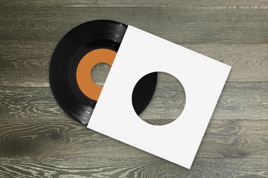 A single 45rpm vinyl record with orange label and white sleeve on wood background
