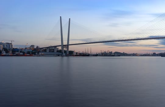 Vladivostok, Russia. Urban landscape with views of the Golden bridge in the evening.