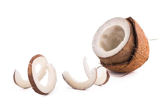 Coconuts with leaves on a white background.