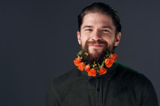 Portrait of a bearded man flowers decoration gift romance. High quality photo