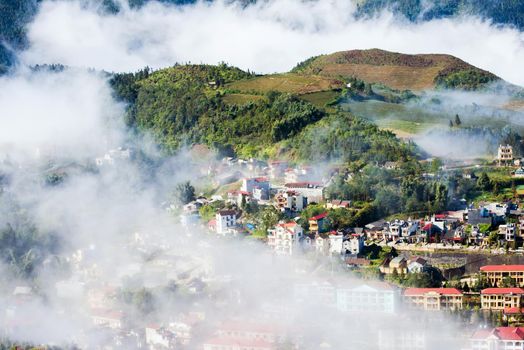 Sapa valley city in the mist in the morning, Vietnam
