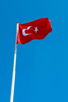 Turkey flag moving on blue sky at sultanahmet square Istanbul,Turkey