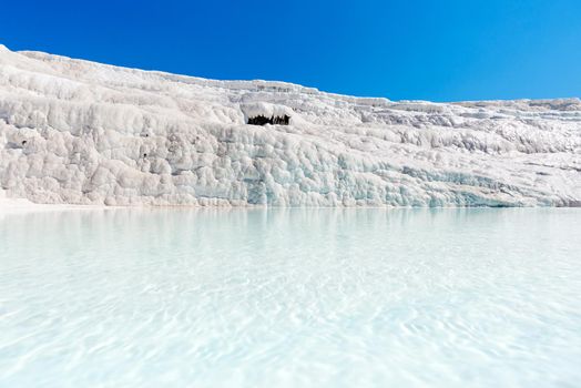 Natural travertine pools and terraces at Pamukkale ,Turkey. Pamukkale, meaning cotton castle in Turkish,Turkey