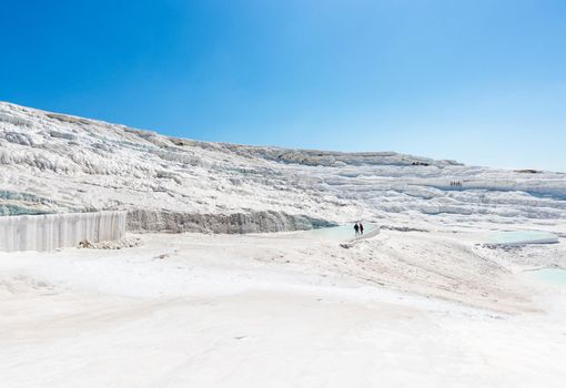 Natural travertine pools and terraces at Pamukkale ,Turkey. Pamukkale, meaning cotton castle in Turkish,Turkey