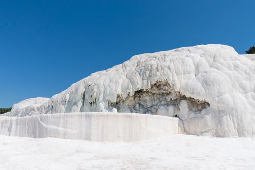 Natural travertine pools and terraces at Pamukkale ,Turkey. Pamukkale, meaning cotton castle in Turkish,Turkey