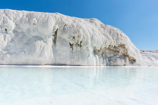 Natural travertine pools and terraces at Pamukkale ,Turkey. Pamukkale, meaning cotton castle in Turkish,Turkey