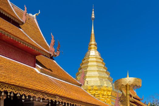 Wat Phra That Doi Suthep with blue sky in Chiang Mai. The attractive sightseeing place for tourists and landmark of Chiang Mai,Thailand