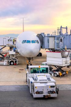 Airport ramp service for for a commercial plane landing at Narita International Airport in Tokyo,Japan.