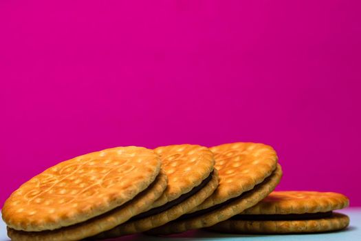 Round biscuits with chocolate cream, sandwich biscuits with chocolate filling isolated.