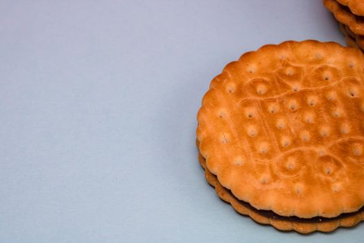 Round biscuits with chocolate cream, sandwich biscuits with chocolate filling isolated.