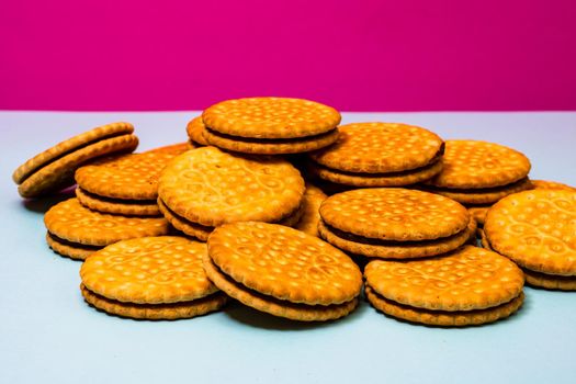 Round biscuits with chocolate cream, sandwich biscuits with chocolate filling isolated.