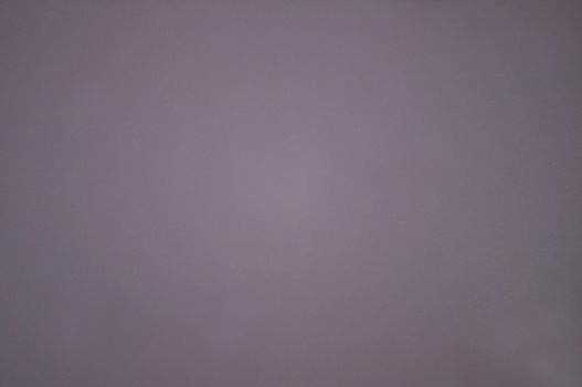 The rough surface of the paper is lilac-colored.Texture or background