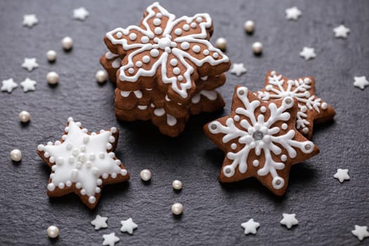 Homemade christmas cookies on slate table