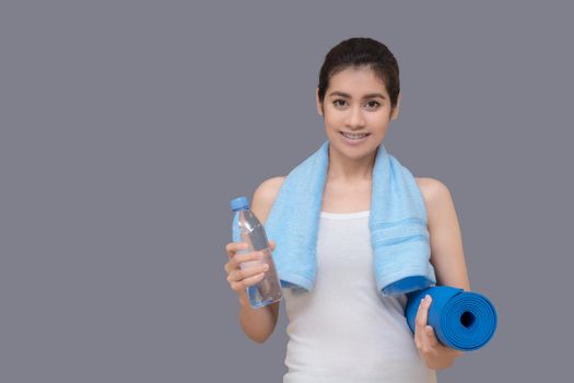 Healthy woman ready to exercise at sport gym, girl doing sport indoor.Photo design for fitness sporty woman and healthcare concept.