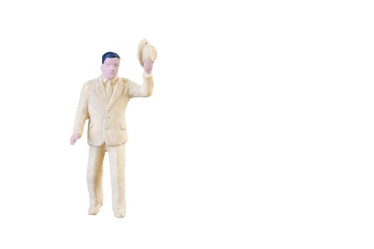 Close up of Miniature people isolated with clipping path on white background.