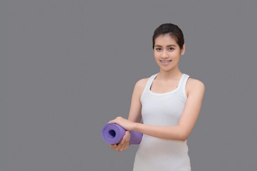 Asian healthy woman ready to exercising at sport gym, girl doing sport indoor.Photo design for fitness sporty woman and health care concept.