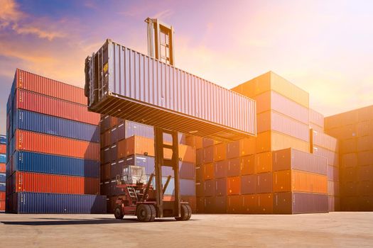 Logistic cargo container in shipping yard with cargo container stack in background. Photo concept for Global business shipping,Logistic,Import and Export industries.