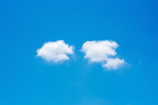 minimal nature white cloud on blue sky background in daytime, photo of nature cloud for freedom and nature concept.