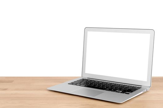 Smart laptop with blank white screen on wooden table with white background.Photo design for smart technology and internet of things concept.