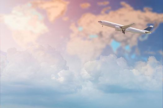 Commercial airplane flying over white clouds sky and world map. Elegant Design with copy space for travel concept.