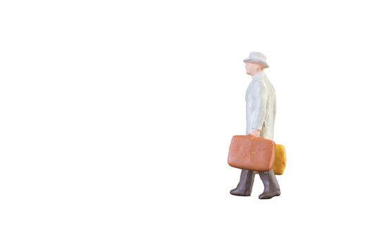 Close up of Miniature businessman and tourist people isolated with clipping paht on white background.Elegant Design with copy space for placement your text, mock up for business and travel concept