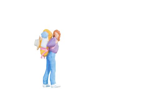 Close up of Miniature backpacker and tourist people isolated with clipping path on white background.Elegant Design with copy space for placement your text, mock up for business and travel concept