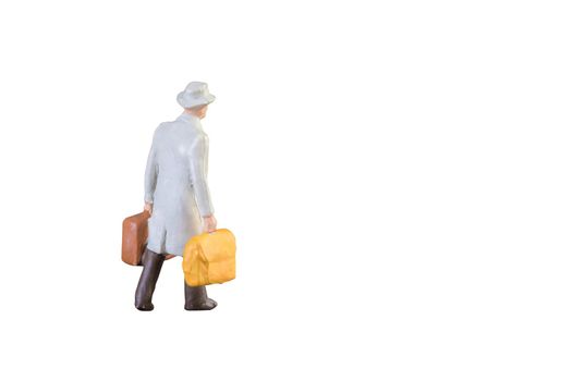 Close up of Miniature businessman and tourist people isolated with clipping path on white background.Elegant Design with copy space for placement your text, mock up for business and travel concept.