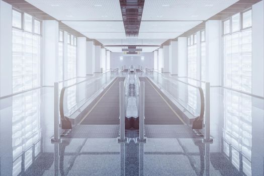 Modern walkway of escalator move forward and escalator move backward in international airport. Escalator is facility for support transportation in modern building