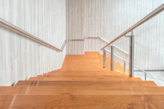 Modern space of wooden stairs interior design in modern building 