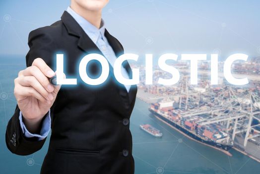 Smart Business woman is writing logistic concept with shipping boat at shipping yard in background for Global business container cargo shipping,Logistic,Import  and Export business concept