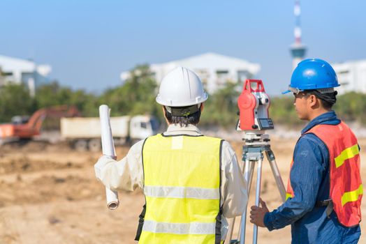 Construction engineer and foreman worker checking construction site for new Infrastructure construction project