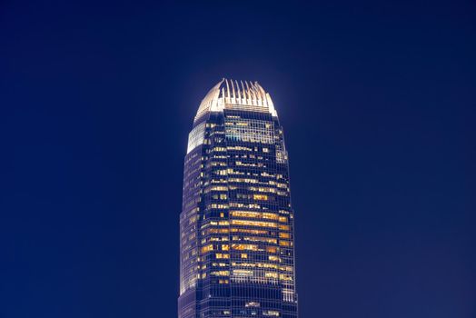 Close up view of Hong Kong landmark office building at night in Hong Kong