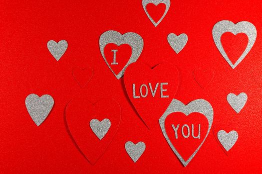 Saint Valentine's day I love you red and silver hearts design on red background