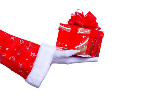 christmas santa claus hand with a present gift box  as a holiday season surprise  with red costume  and  gloves , isolated on white background with