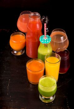 Various freshly squeezed fruits and vegetables juices