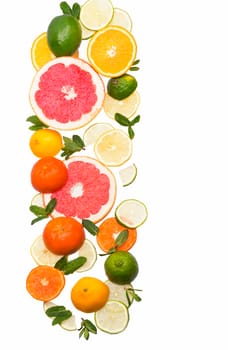 Citrus background. Fresh citrus fruits - Lemons, oranges, limes, grapefruits On wooden background