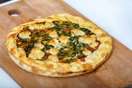 Vegetable Tart, puff pastry, chard, carrot, onion, garlic and red peppers.