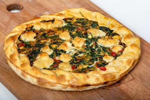 Vegetable Tart, puff pastry, chard, carrot, onion, garlic and red peppers.