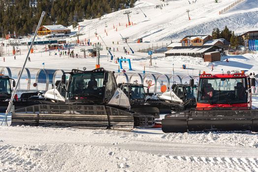 Grandvalira, Andorra: 2021 January 17: Prinoth Snow Groomers  from the Grandvalira ski resort in El Tarter Andorra in time of COVID19 in winter 2021.