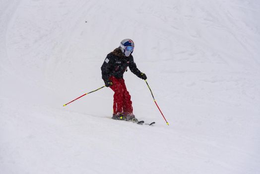 Grandvalira, Andorra: 2021 January 03: Woman on snowborad in the Pyrenees at the Grandvalira ski resort in Andorra in Covid19 time