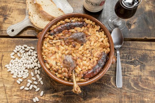 French specialty: cassoulet, a meal with white beans, duck leg, sausage and bacon.