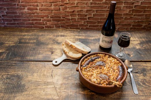 French specialty: cassoulet, a meal with white beans, duck leg, sausage and bacon.