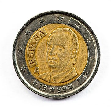 photograph of a one euro coin on a white background