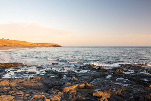 Sunset in the Atlantic Sea on the Island of Fuerteventura in Spain.