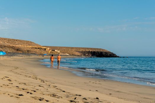 Playa de la Señora, Spain - 2020 Octubre 7: Nudist beach on Canary Island Fuerteventura. December 21, 2011 in Playa de la Señora, Spain