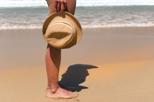 Hat on the virgin beaches on the island of Fuerteventura. Cofete beach on the island of Fuerteventura, Spain.