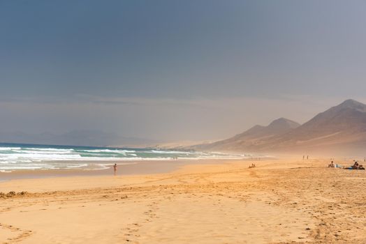 Fuerteventura, Spain : 2020 October 7 : People in the Virgin beaches on the island of Fuerteventura. Cofete beach on the island of Fuerteventura, Spain.