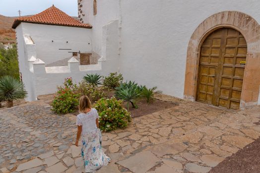 Betancuria, Fuerteventura, Spain : 2020 October 6 :  Young Blonde in Bentancuria on the island of Fuerteventura in Spain in summer.